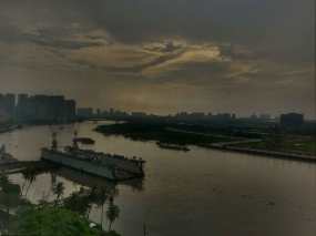 Morning view from our room of the Saigon River